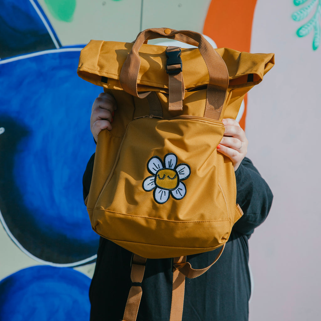 milk and moon mustard daisy backpack 