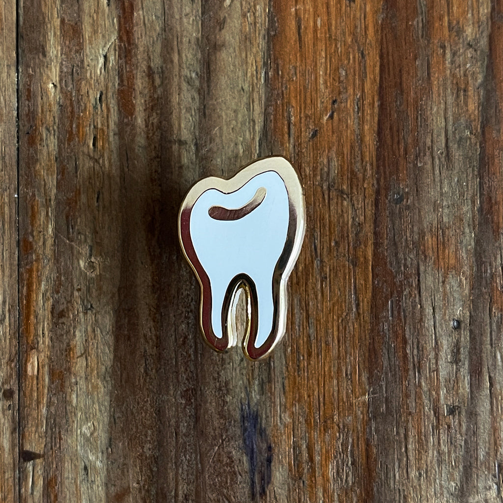 tooth enamel pin by milk and moon 